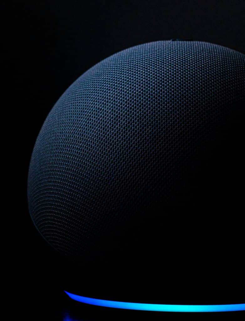 alexa-smart-home-device-blue-round-textile-on-black-background